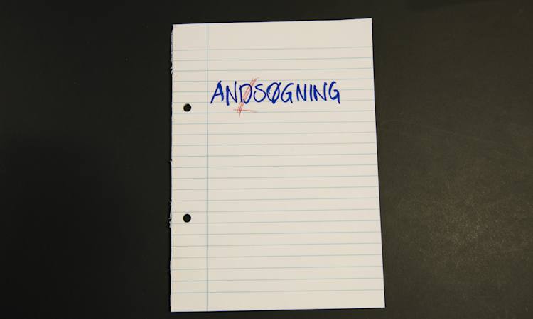 Et papir hvorpå der er skrevet "Andsøgning" og hvor d'et er streget over