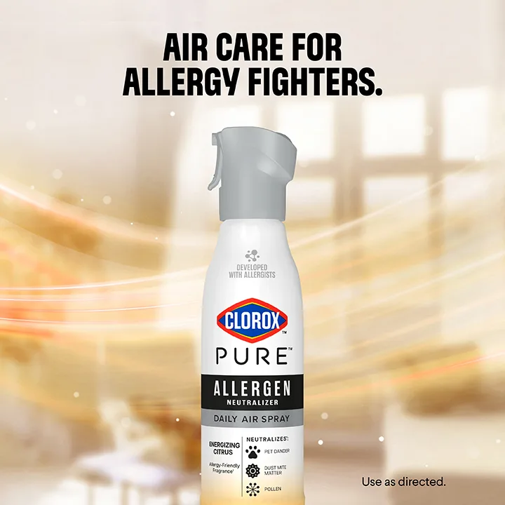 Air Care for Allergy Fighters: a bottle of PURE Allergen spray with a green swoosh of light in the background