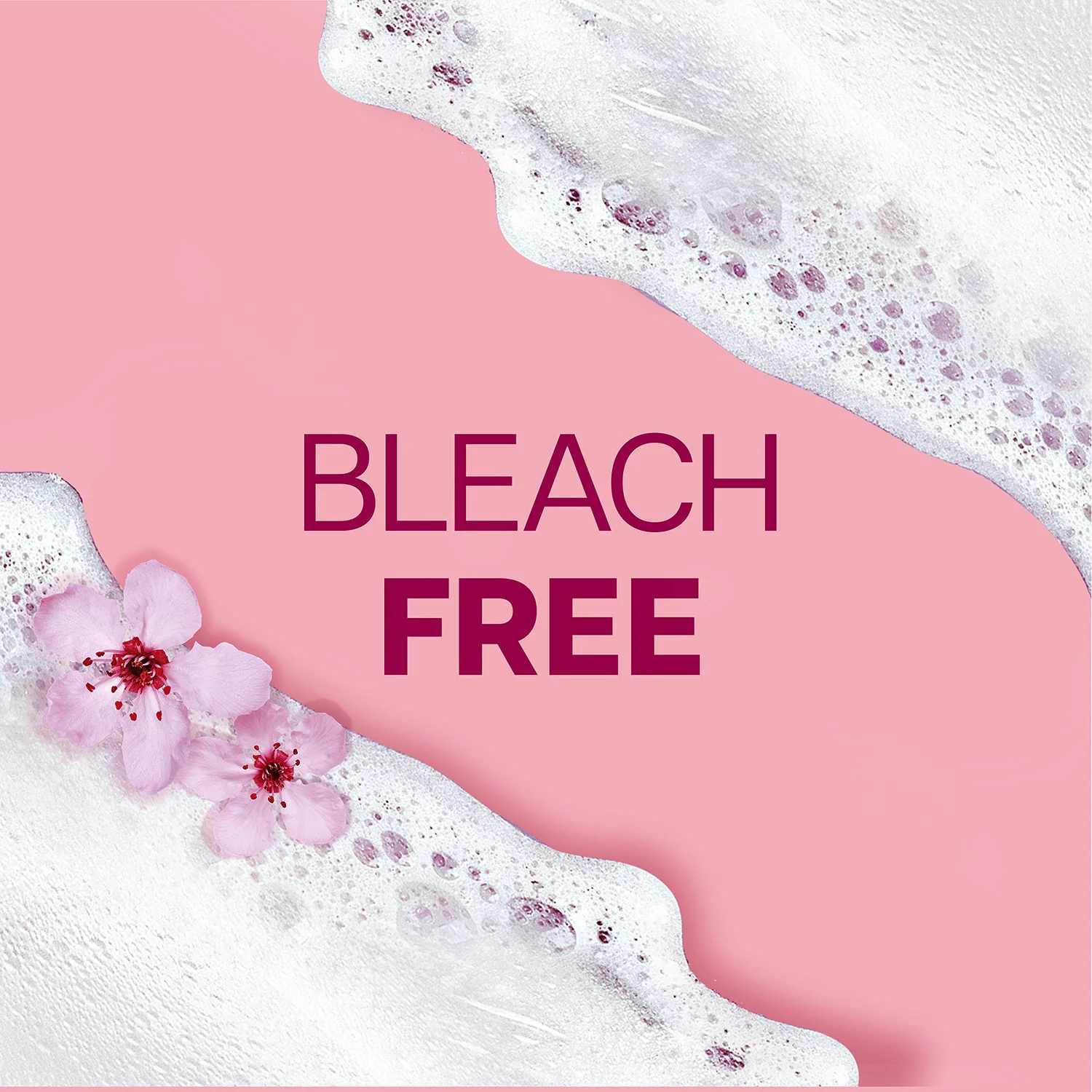 Espuma del océano sobre un fondo rosa con flores de cerezo y las palabras: "No contiene blanqueador"