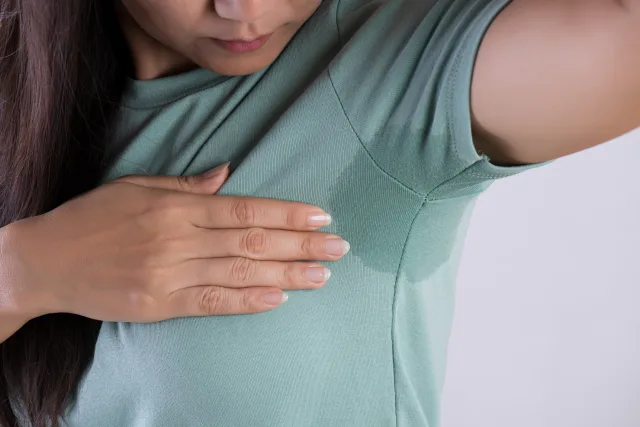 How to Get Body Odor and Sweat Smells Out of Clothes