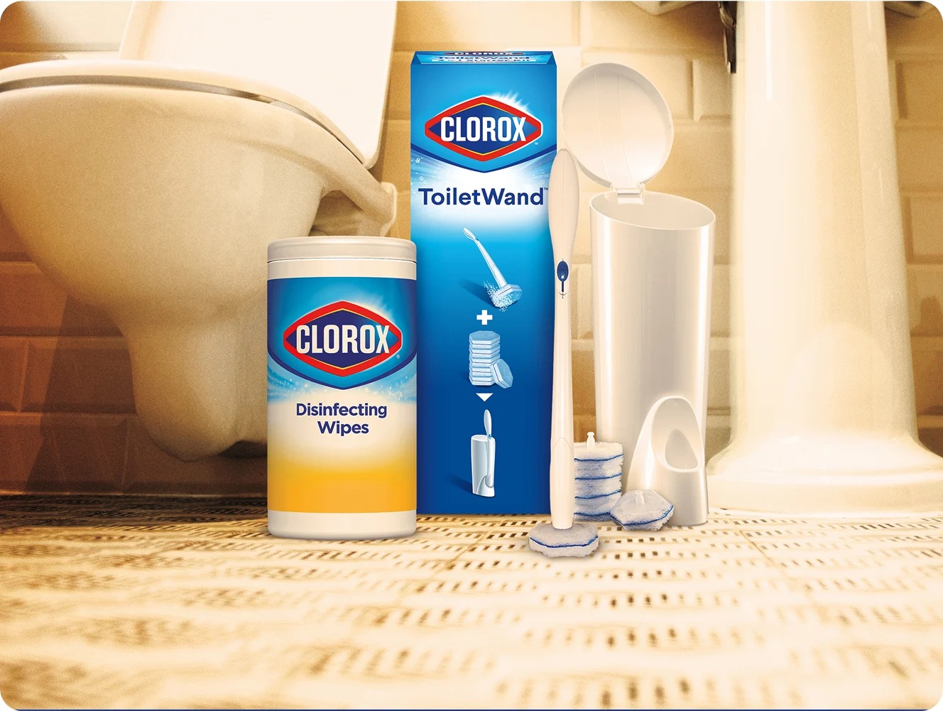 Clorox Disinfecting Wipes and ToiletWand in a bathroom next to a toilet on a tile floor