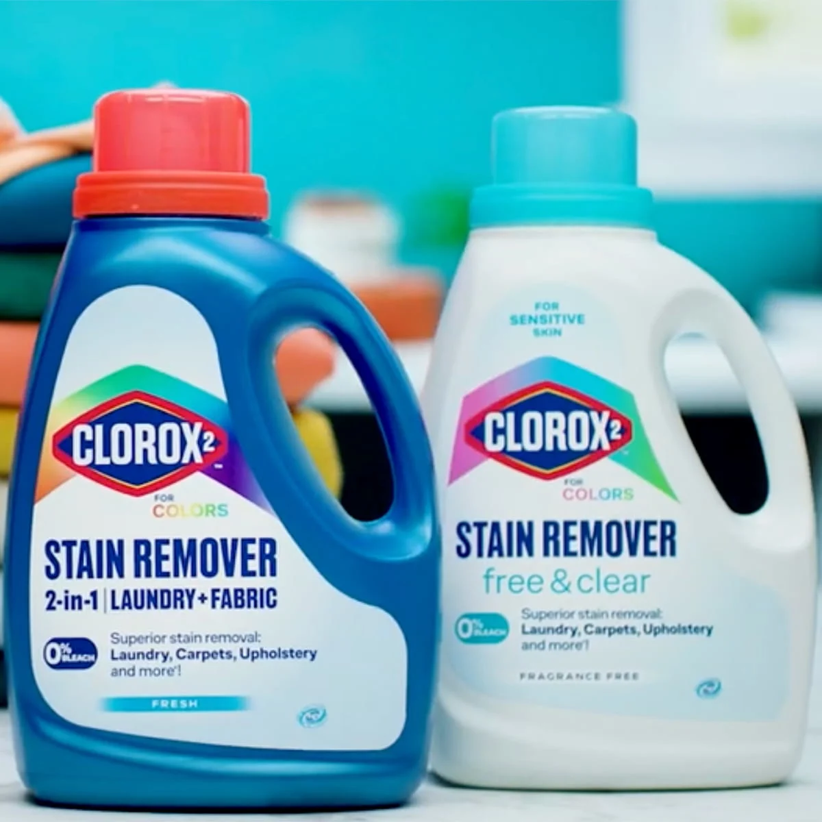 Two Clorox 2 stain remover bottles for colors, one fresh and one free & clear, on a counter