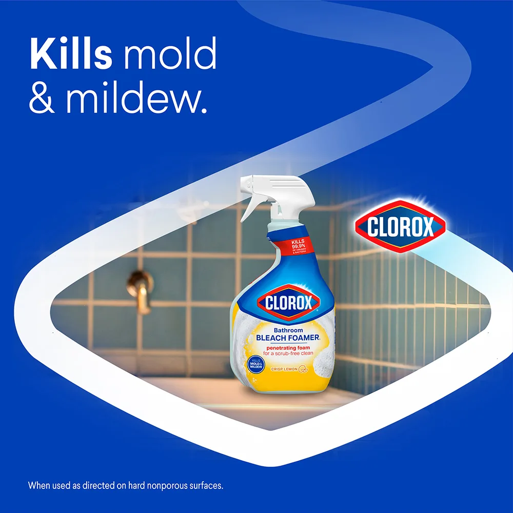 Text says: Kills mold & mildew. Bleach Foamer Lemon on edge of bathtub, blue background with white chevron