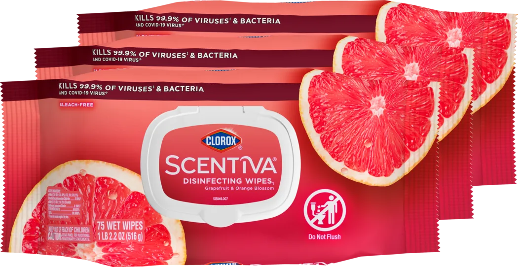 Three flat packs of Clorox wipes in grapefruit Scentiva scent with round slices of citrus printed on the package.