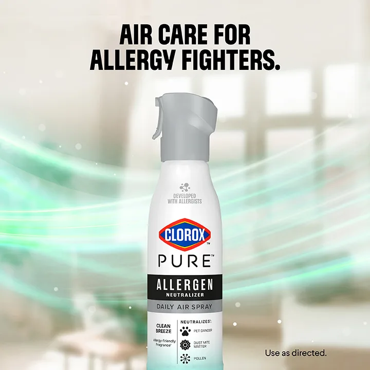 Air Care for Allergy Fighters: a bottle of PURE Allergen spray with a green swoosh of light in the background