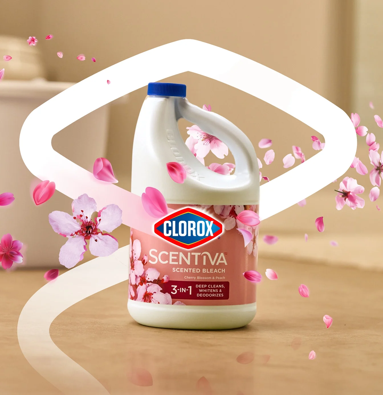 Bottle of Scentiva bleach Cherry Blossom scent on the floor decorated with cherry blossom flowers.