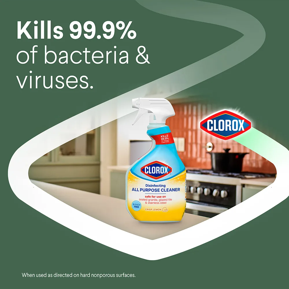 Kills 99.9% of bacteria & viruses, All Purpose spray bottle on tile with green background and white chevron