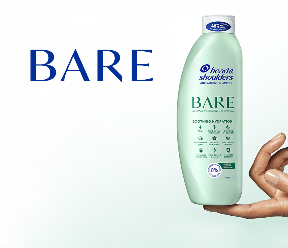 BARE Pure Clean: oily scalp shampoo bottle with BARE title on the right, on the left, two young people, a man and a woman, smiling