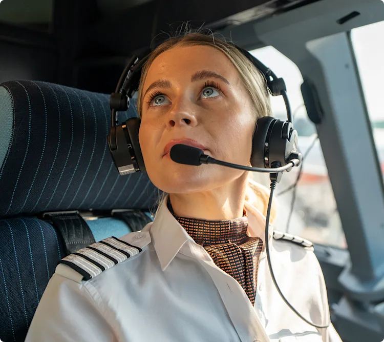 UNIFORMS Gatwick Pilot with headset on