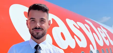 M1 easyJet cabin crew member by plane