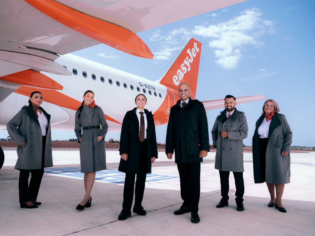 M1 easyJet cabin crew member by plane
