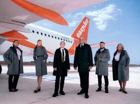 M1 easyJet cabin crew member by plane