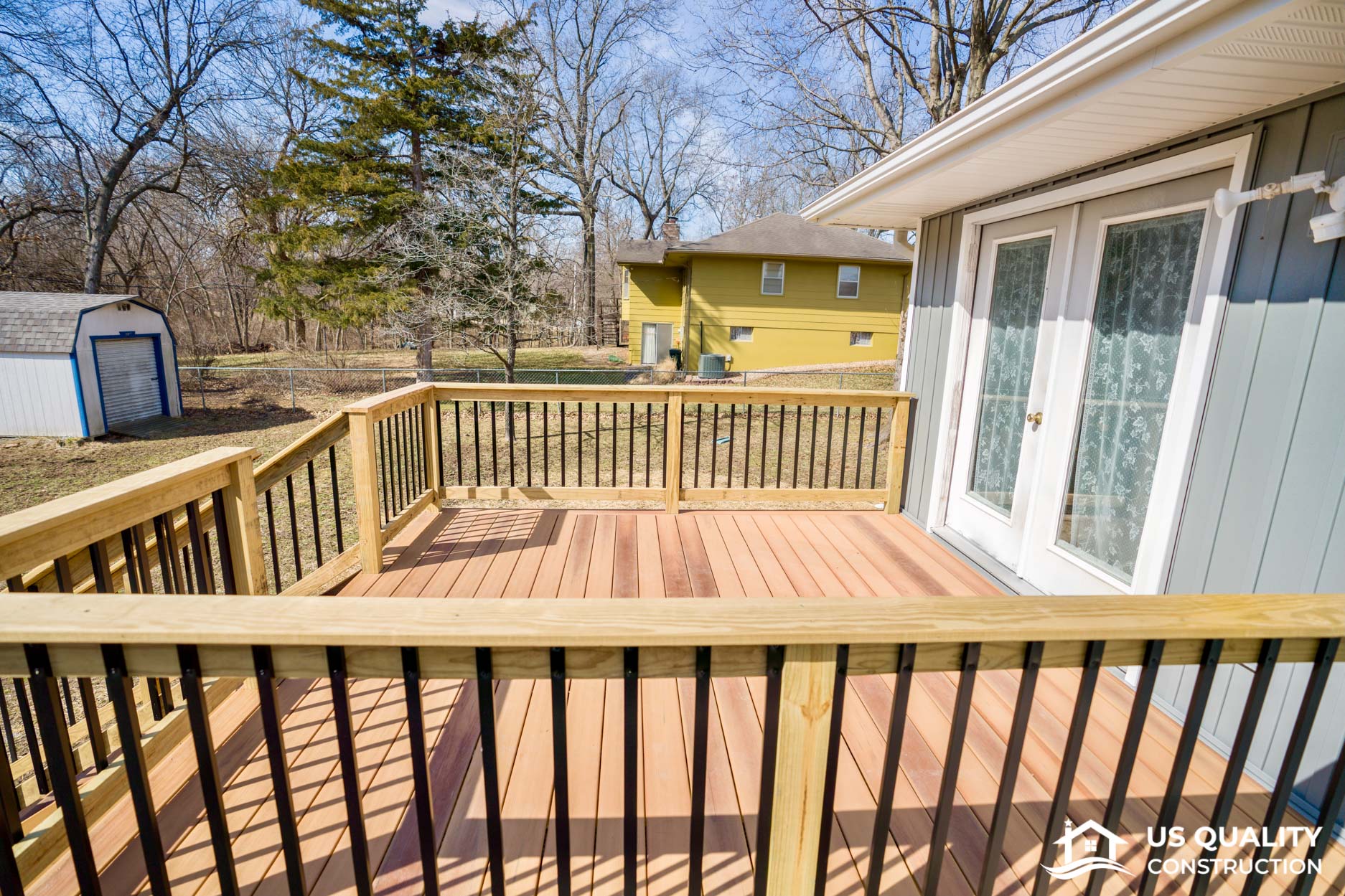 Siding, Concrete Patio & Composite Deck