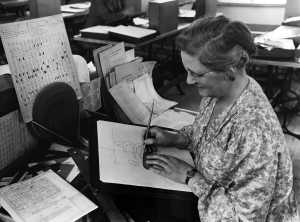 Monotype employee Dora Laing drawing an Arabic character, in reverse, at a size of 10-inch. The photograph was most likely taken in the late 1950s. Courtesy Richard Cooper.