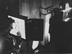 Patricia Saunders (then Patricia Mullett) in the Monotype Drawing Office in 1955, aged 22. © Monotype Archives