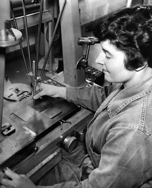 A Monotype employee operating a punchcutting machine, c. 1955. Courtesy Richard Cooper