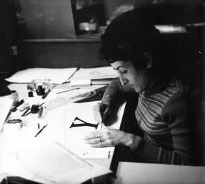 IPC employee Annette Celso-Blanchard filling in a drawing with black ink, Paris, early 1970s. Courtesy Musée de l'imprimerie & de la communication graphique