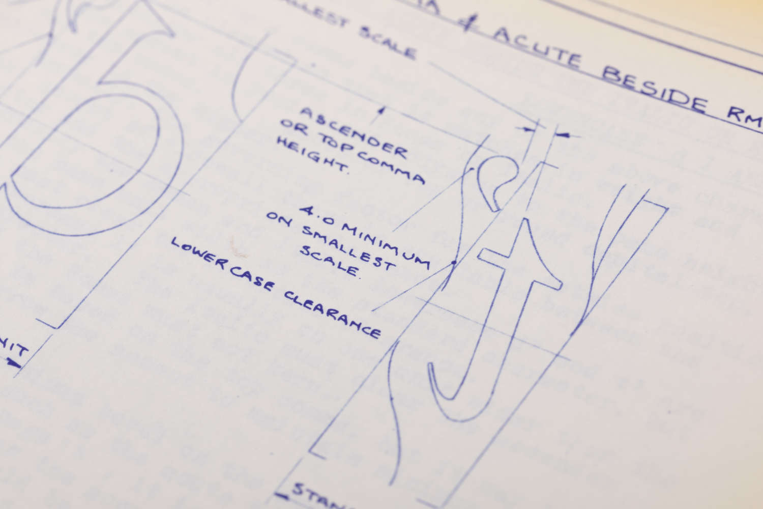 Closeup of a page from the instruction manual of the Monotype Type Drawing Office, providing instructions on accent placement and scale, 1970s. © Monotype archives