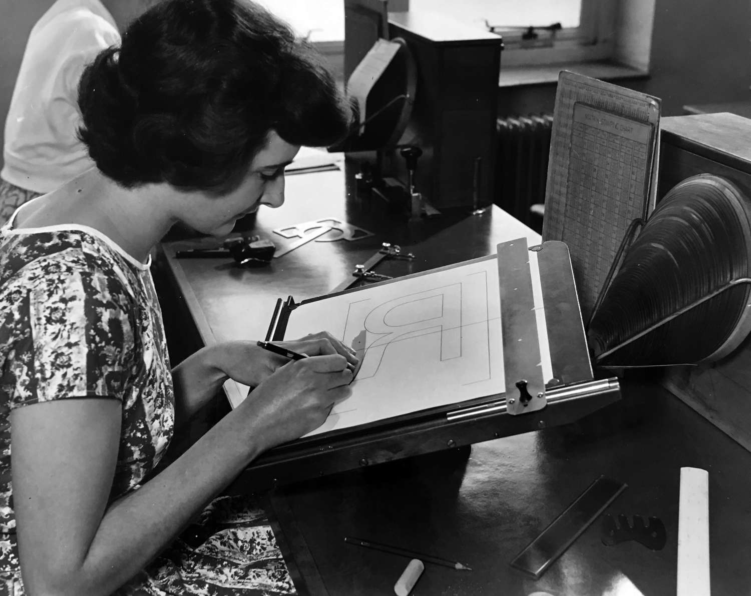 Undated photograph of a female drawing clerk in the Monotype TDO. Courtesy of Richard Cooper