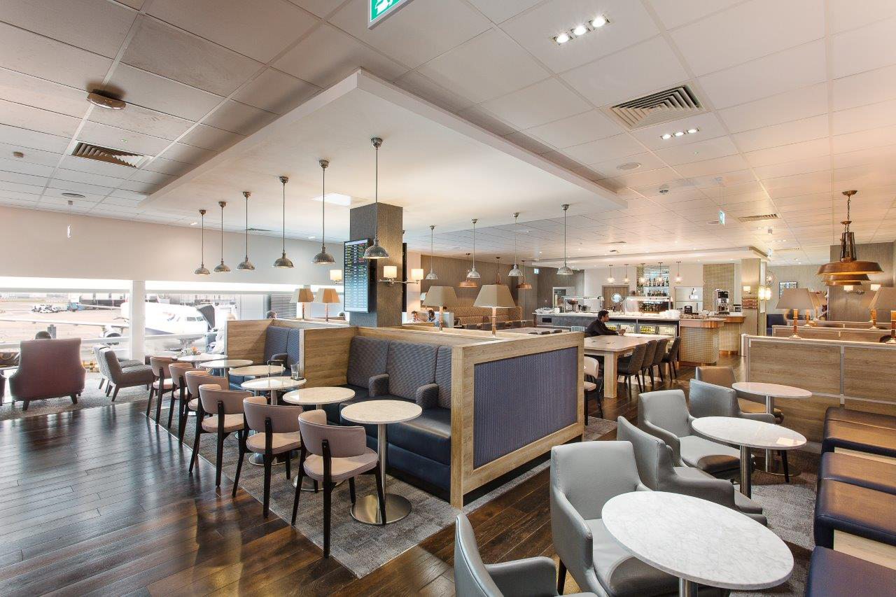 airport lounge, benches and chairs with tables 