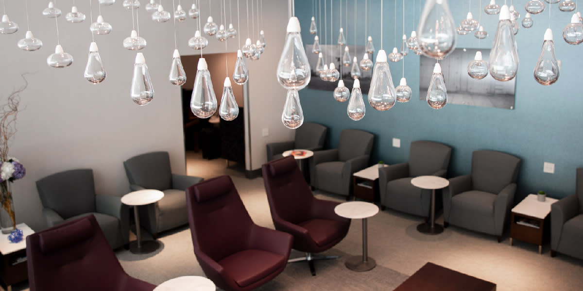 Airport Dimensions, The Club, Airport Lounge Space with chairs and lights