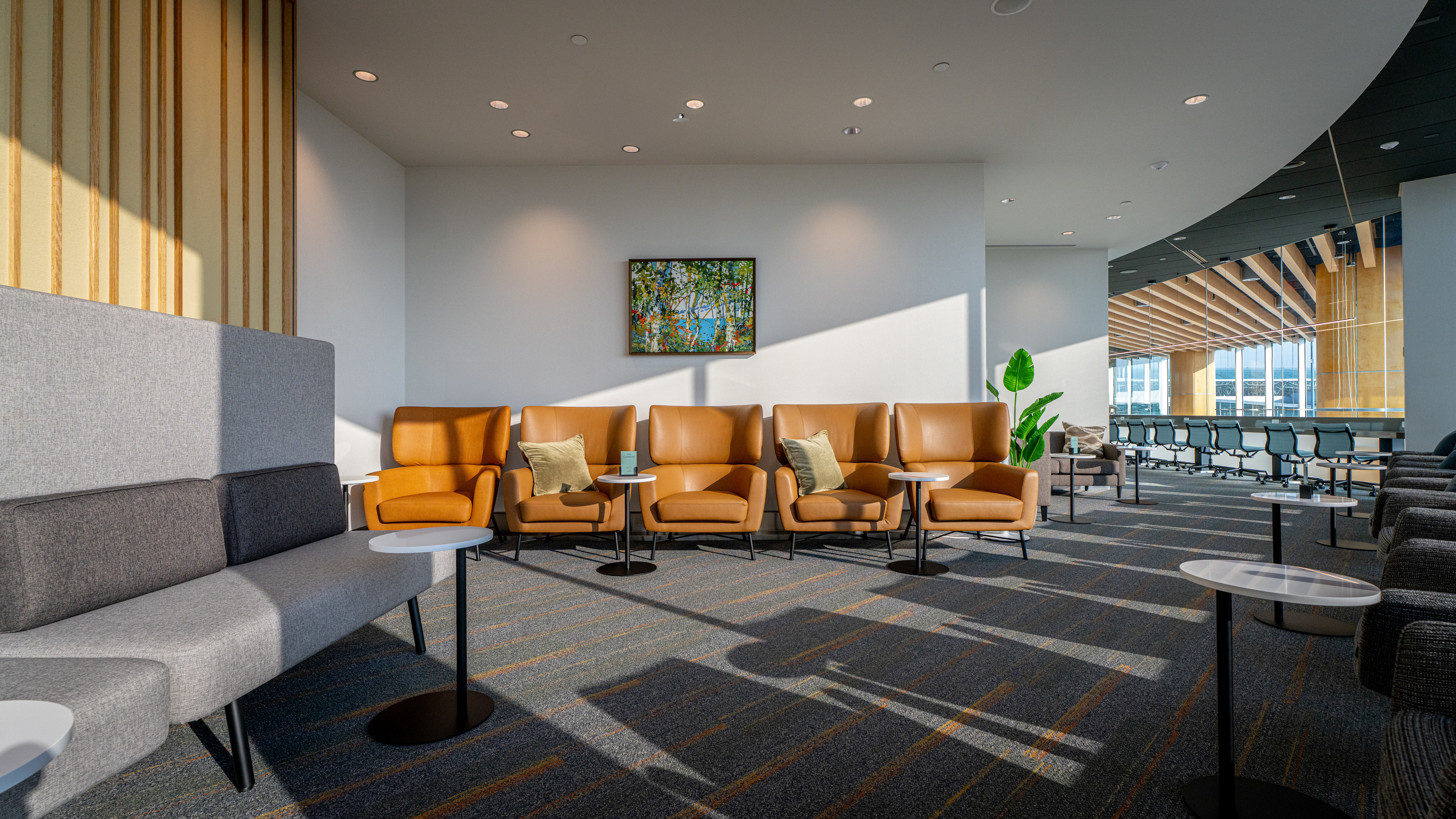 The Club airport lounge seating area