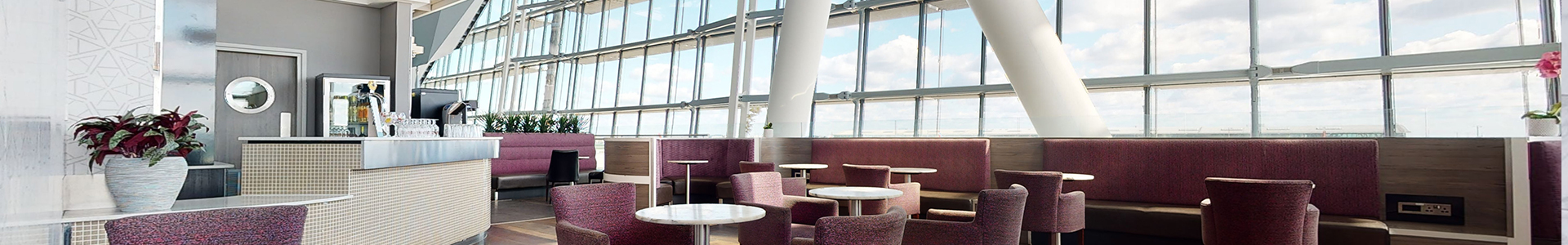 Airport Dimensions, Club Aspire, Airport lounge seating area with runway views
