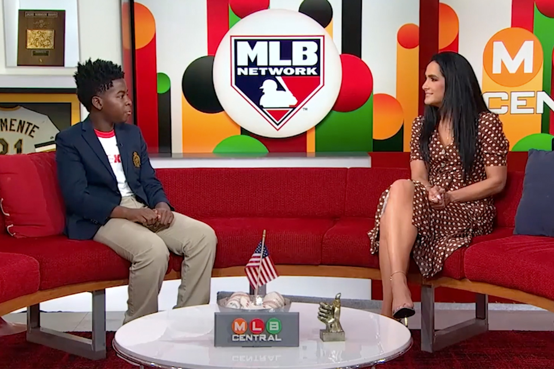 A boy and young woman on the set of MLB Network's show, MLB Central