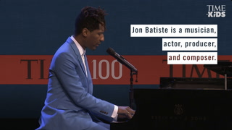 Image of man, Jon Batiste, playing the piano with text overlay that reads, "Jon Batiste is a musician, actor, producer, and composer."