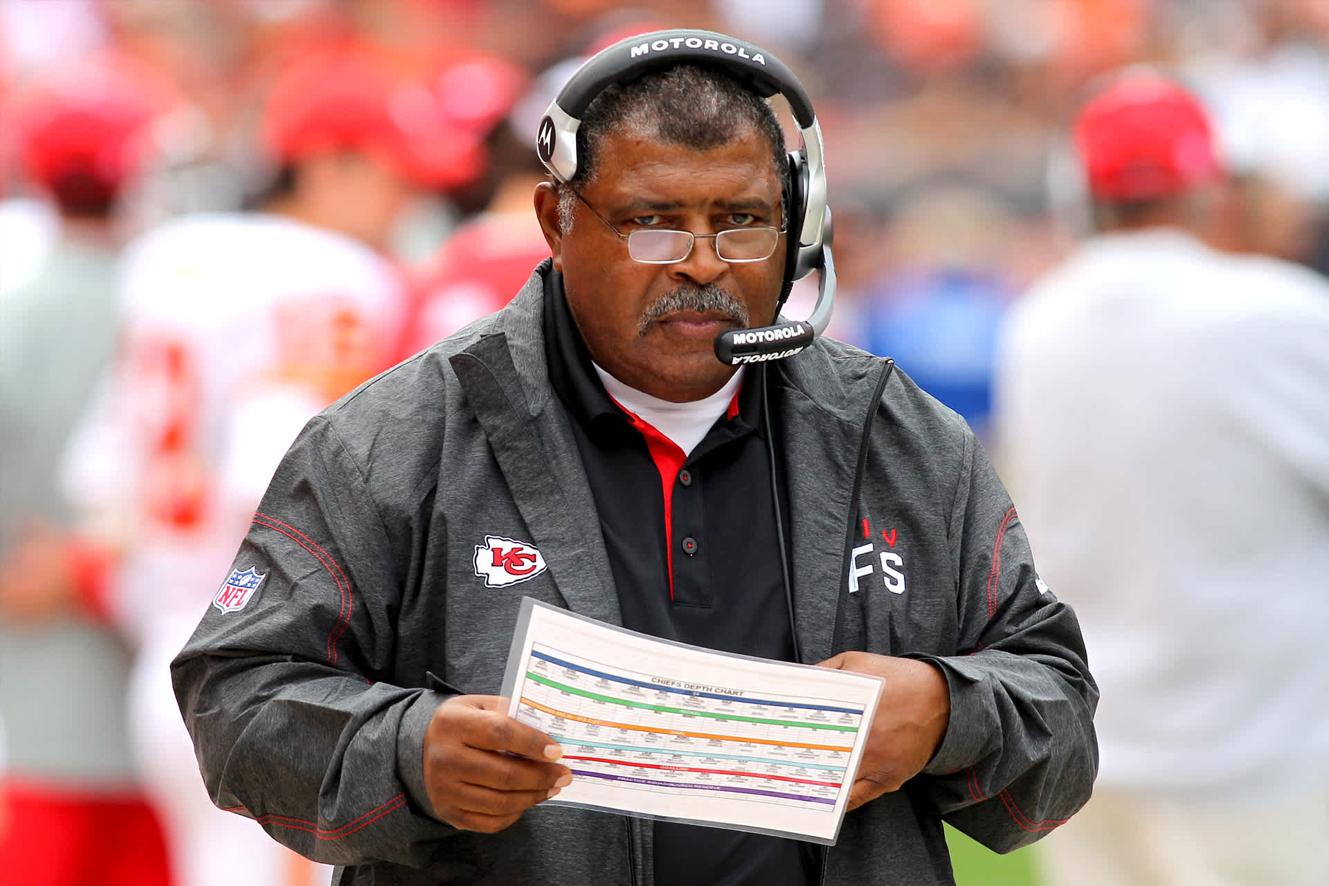 Romeo Crennel watches his team play the Cleveland Browns, in Cleveland, Ohio.