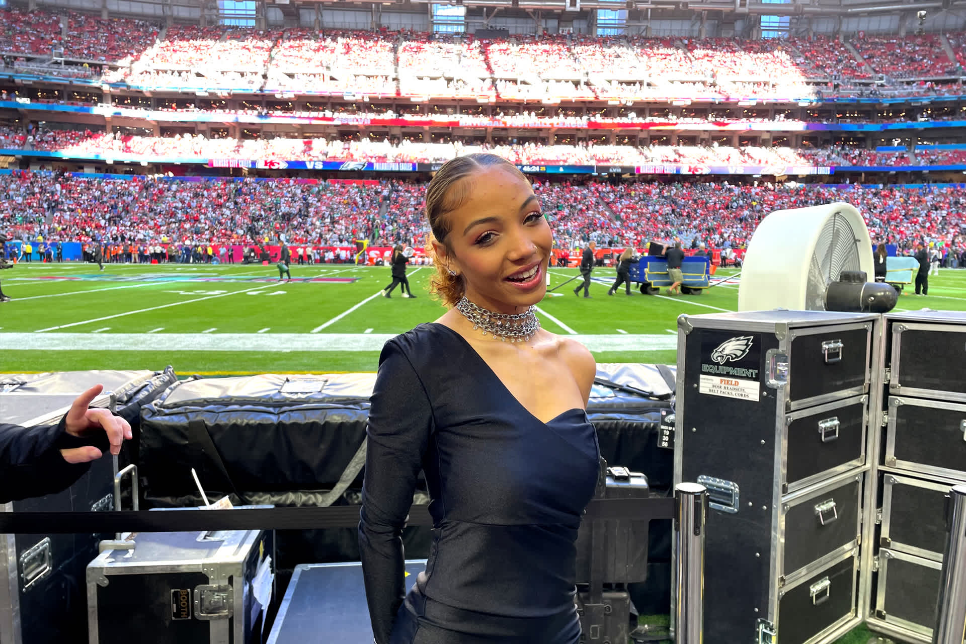 Woman posing in football stadium