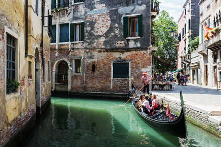 A traditional gondola overlooking a canal