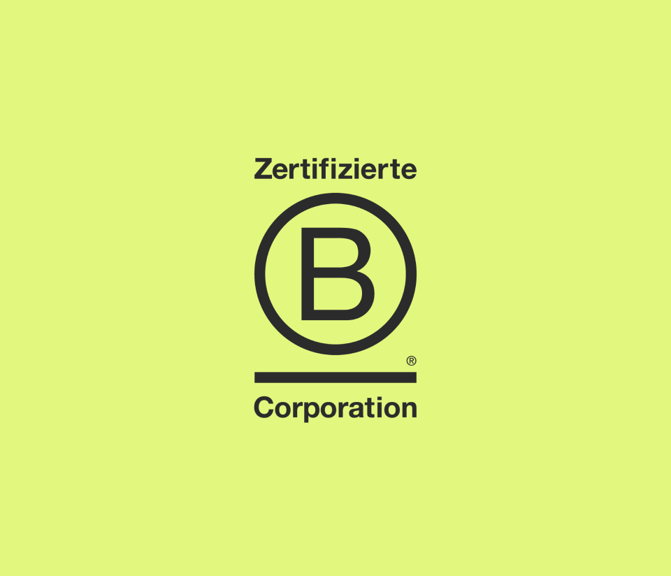 B Corp logo with a green background