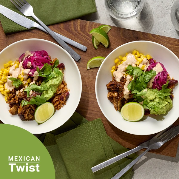 Burrito bowl with pulled chicken, chipotle creme & pickled onion​