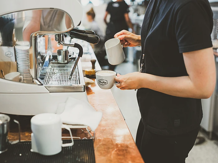 Preparing coffee, espresso machine