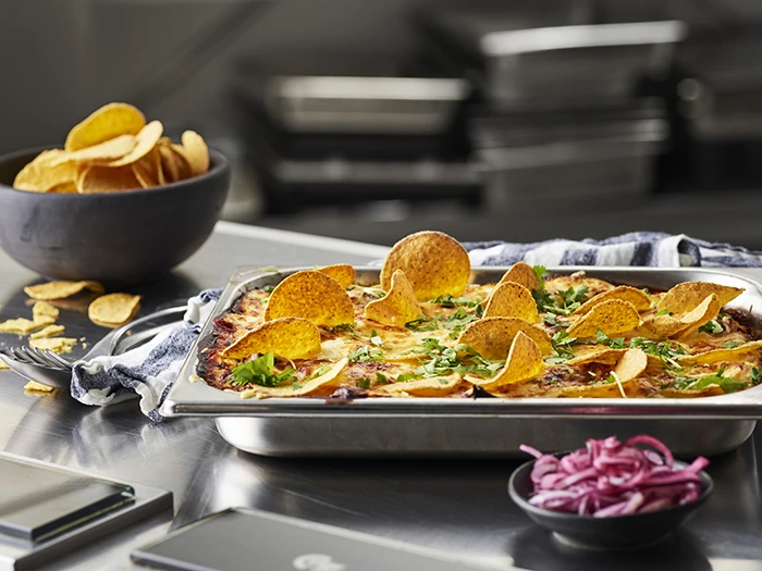Baked dish with nacho chips