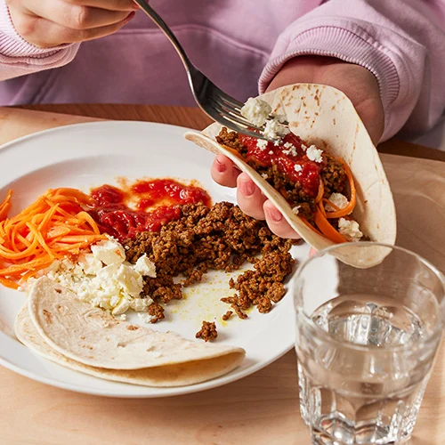 Season ground beef