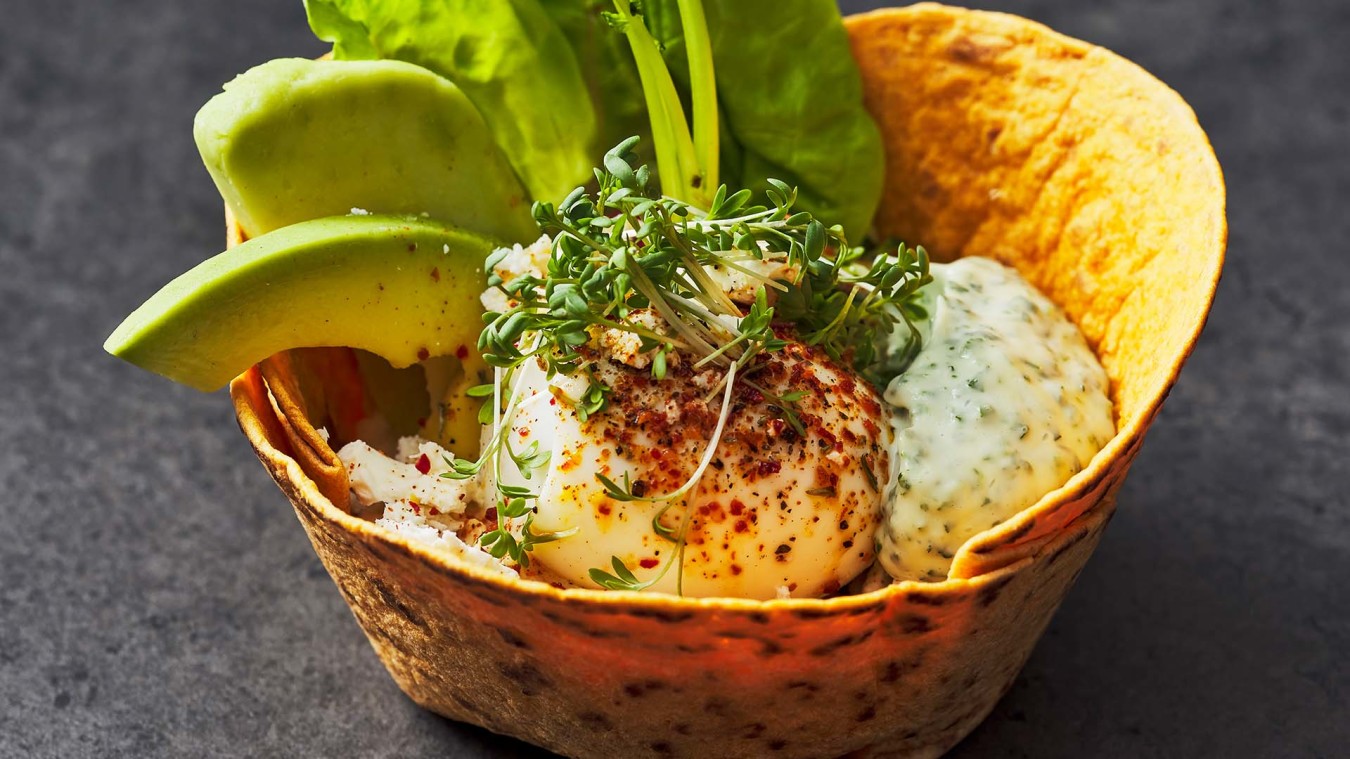 Brekkie bowl with chili roasted courgette, egg and feta cheese