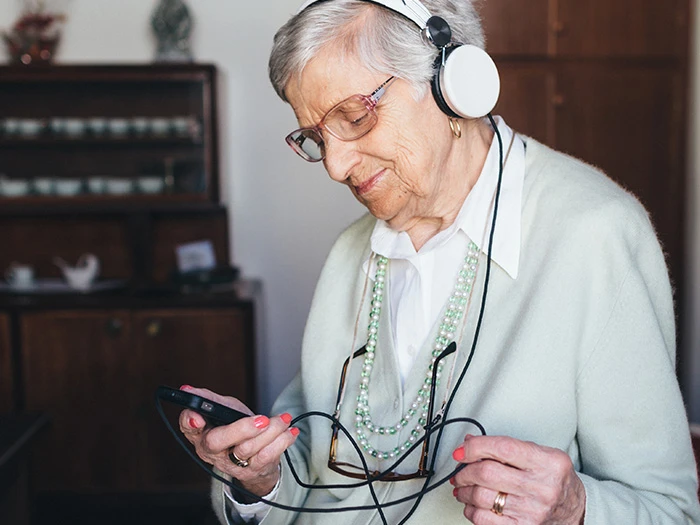 Old person with headphones