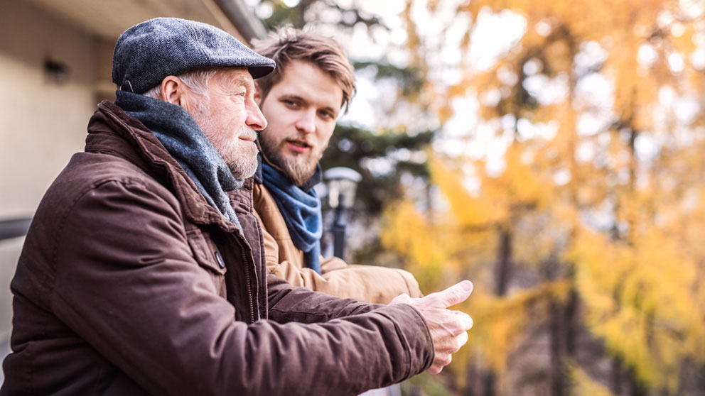 knowlege-father-son-talking-outside.jpg