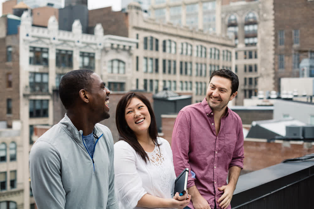 Blog - Hero - Three people on rooftop