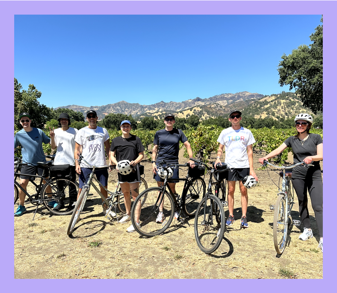 Cartwheel - Seven people posing with bikes