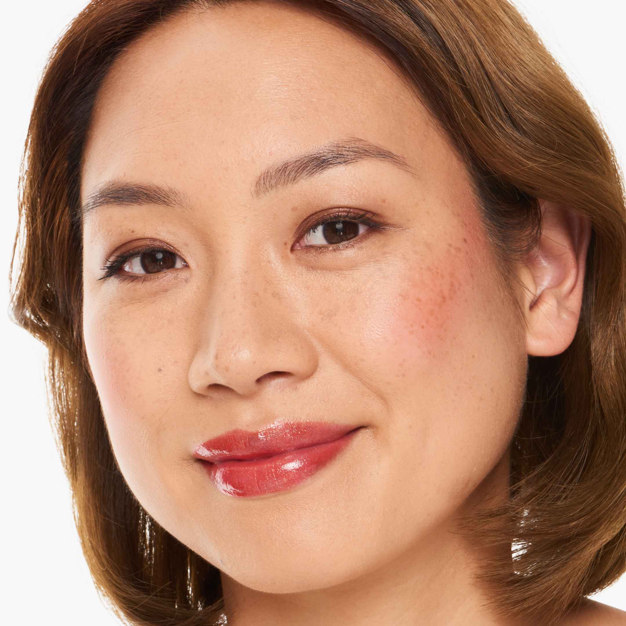 Trinh wears Sheer Shimmer in Mama and Eye2Eye in Empress. 