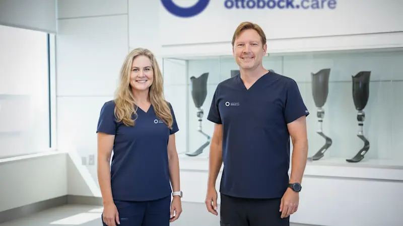 Peter Harsch and Shellie, CPO standing in the waiting area of a Peter Harsch Ottobock Care clinic