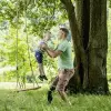 A prosthetic user plays outside with their child thanks to the Ottobock-manufactured C-Leg microprocessor knee