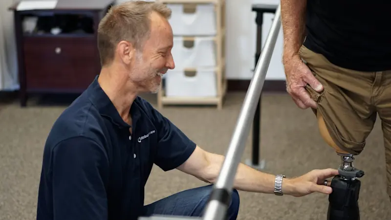 A Certified Prosthetist with an amputee patient in a Limb Specialists Ottobock.care clinic