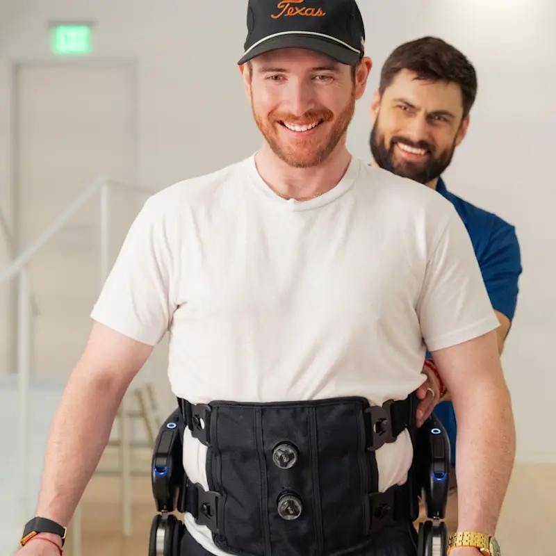 A patient and orthotic clinician conducting a gait training
