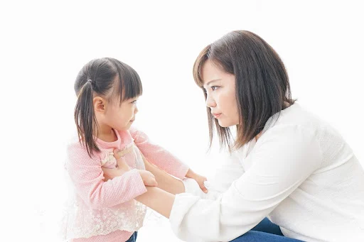 相談する親子