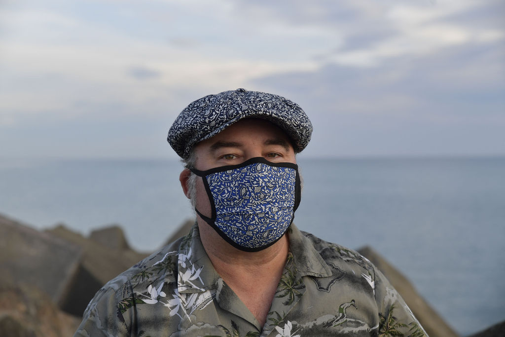 Stylish face mask and hat by Hills Hats. 