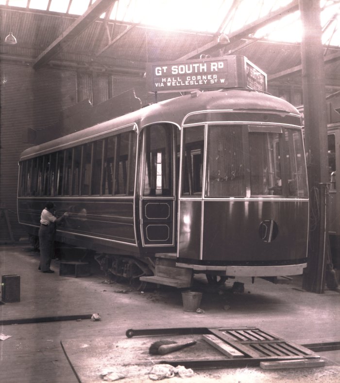 Victor Gibbon. Circa 1937 – 1938. Tram 248 being painted at the Auckland Transport Boards Manukau Road Workshops paint shop when new. Supplied by David Cawood from the Graham Stewart Collection.  
